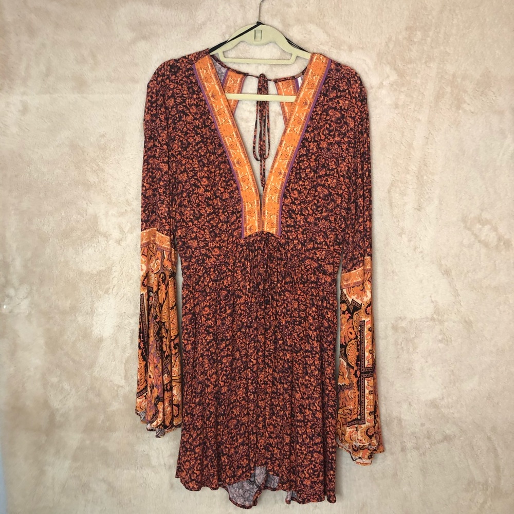 FREE PEOPLE ORANGE FLOWY ROMPER SZ LARGE